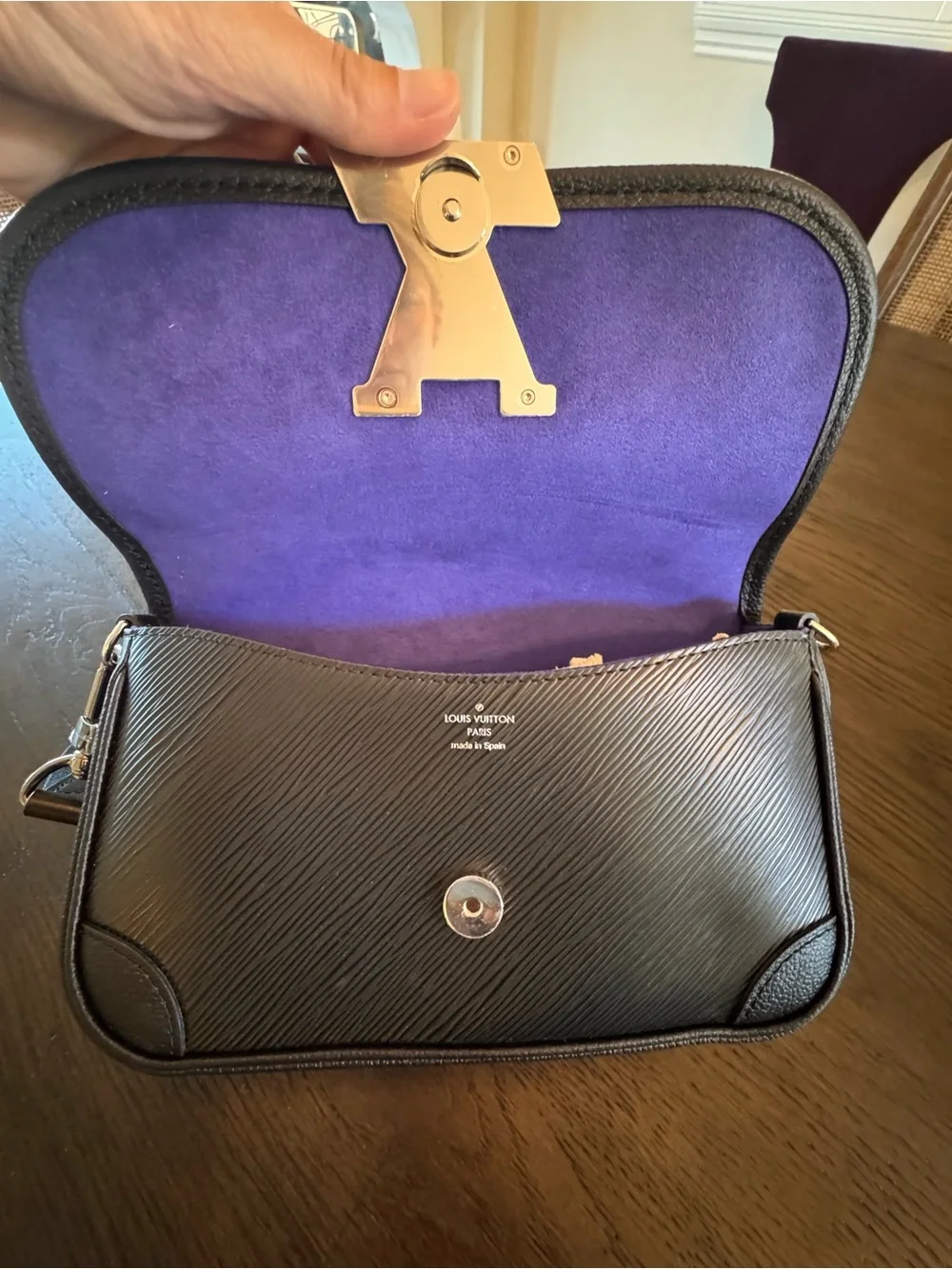 Brand new Louis Vuitton Black Buci bag with 2 Louis Vuitton straps.